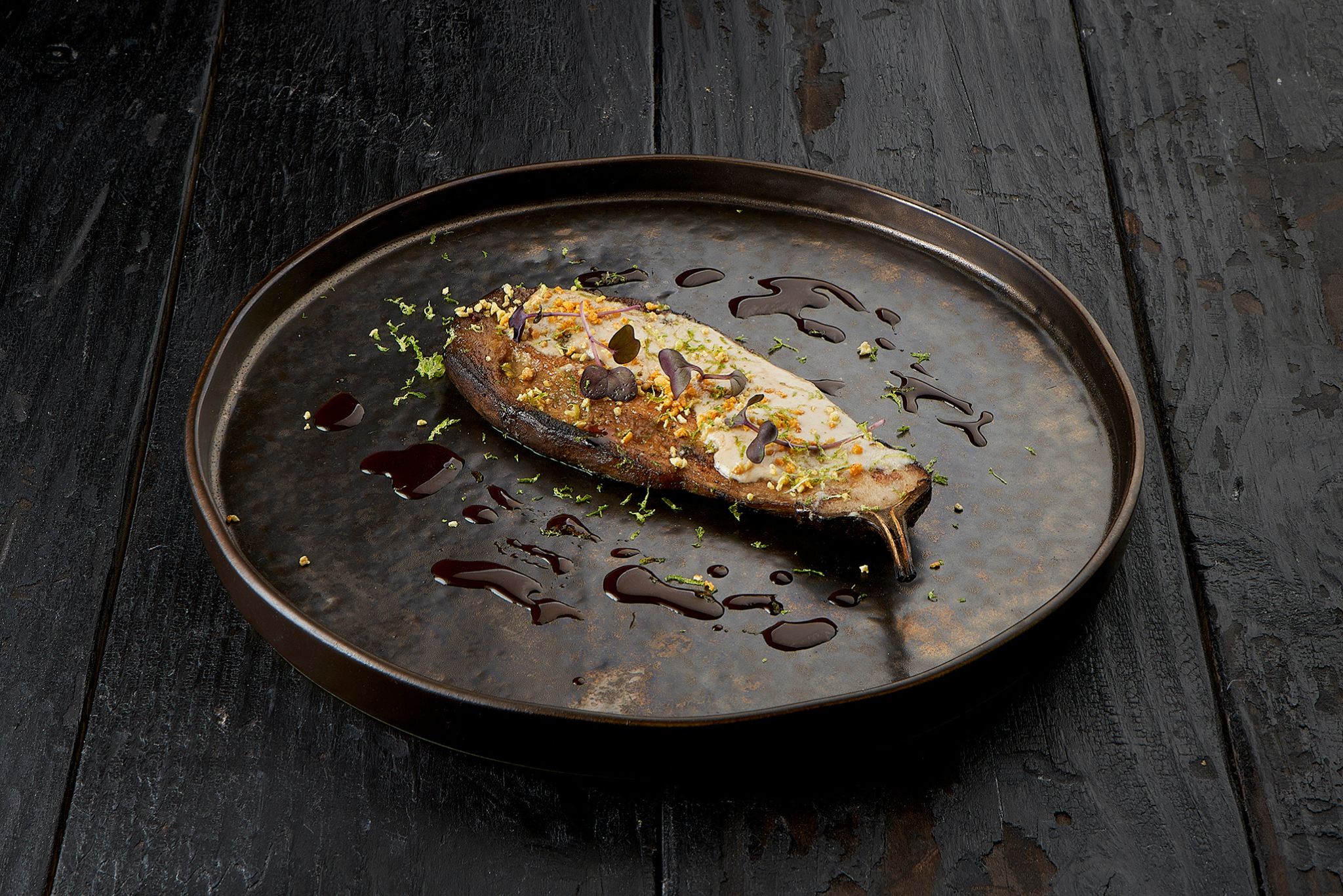 Puffed aubergine with tahini sauce